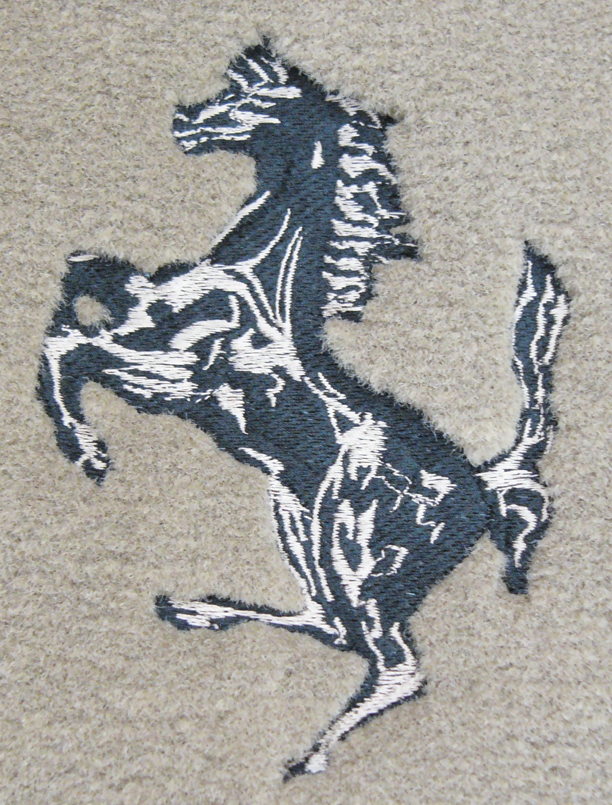 Tan/Black horse embroidery detail